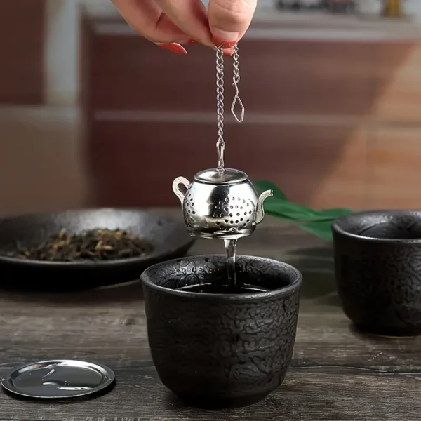 Teáskanna formájú teaszűrő (teatojás)